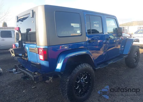 2009 Jeep Wrangler Unlimited Sahara from USA, damaged, VIN 1J4GA59149L776609